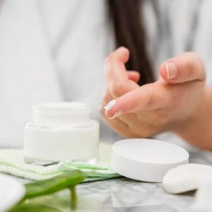 close up hand with cream finger 23 2148708043
